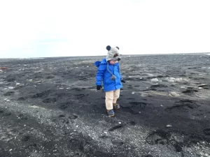 Iceland with Kids: How to Plan the Perfect Family Road Trip 4 Child volcanic dirt Iceland Atlas Introspective