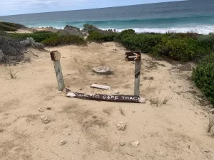 cape to cape broken sign Atlas Introspective